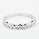 18kt White Gold Tension Set Graduating Natural Diamonds in Band Ring R062416
