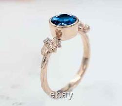 2Ct Round Cut Moissnaite Blue Topaz Engagement Ring Bezel Set 14K White Gold FN