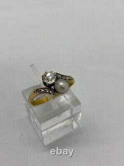 Fine 18k gold ring with 0,61 carats of natural diamonds and a cultured pearl