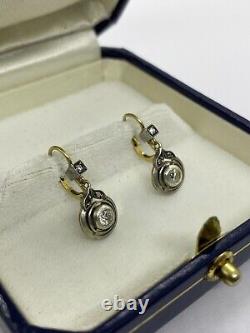 Fine antique 18k gold and platinum art deco earrings with natural diamonds